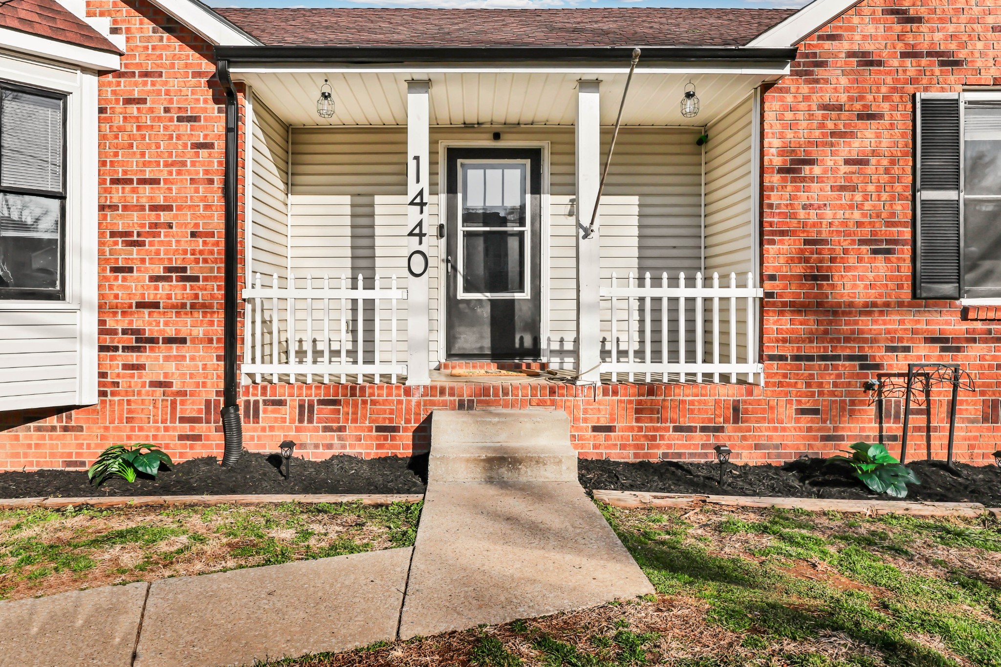1440 McClardy Road Clarksville, TN 37042 - Photo 4 of 33 a front view of a house with a yard