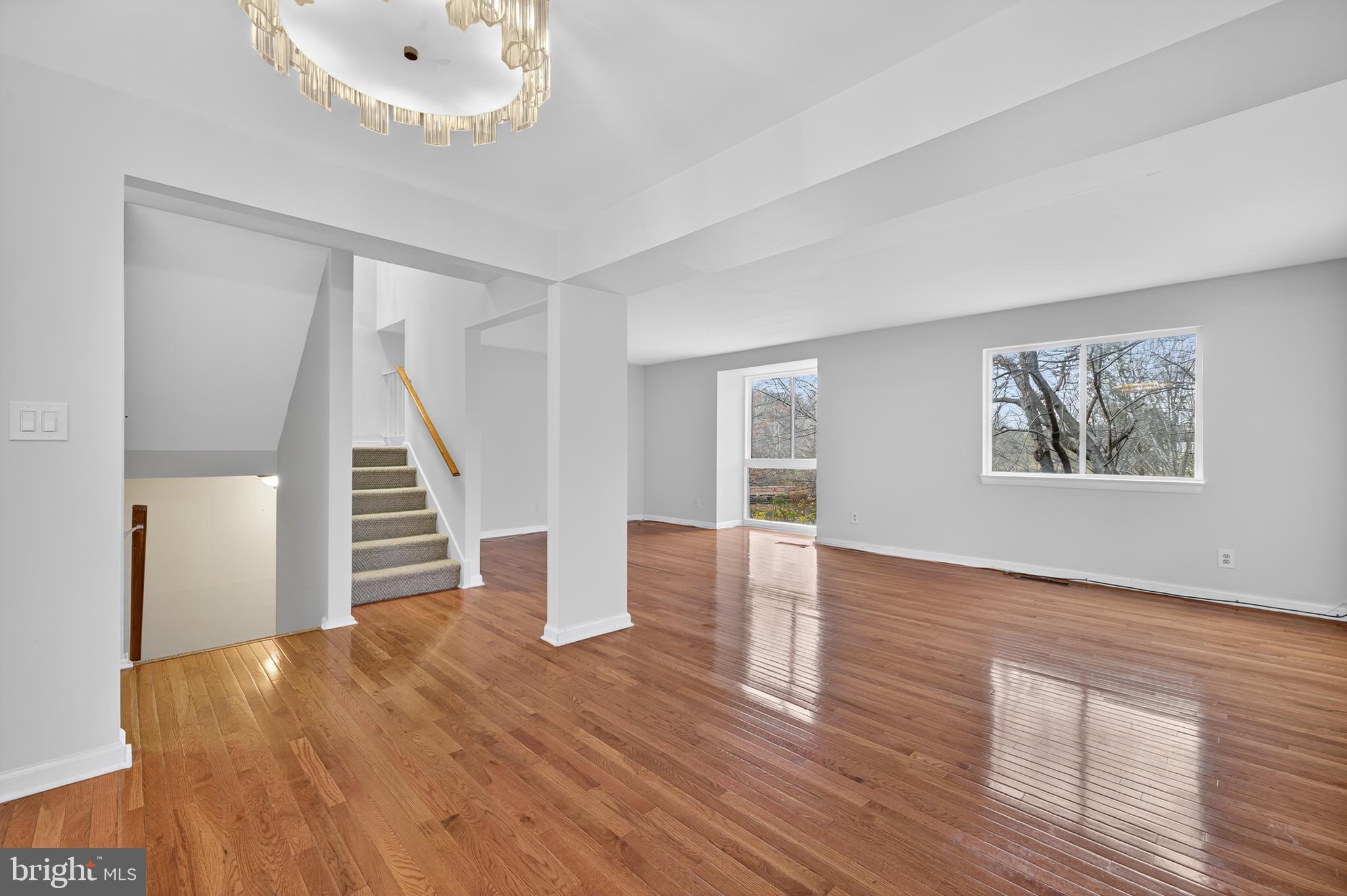 9961 Lake Landing Road Gaithersburg, MD 20886 - Photo 11 of 40 a view of empty room with wooden floor