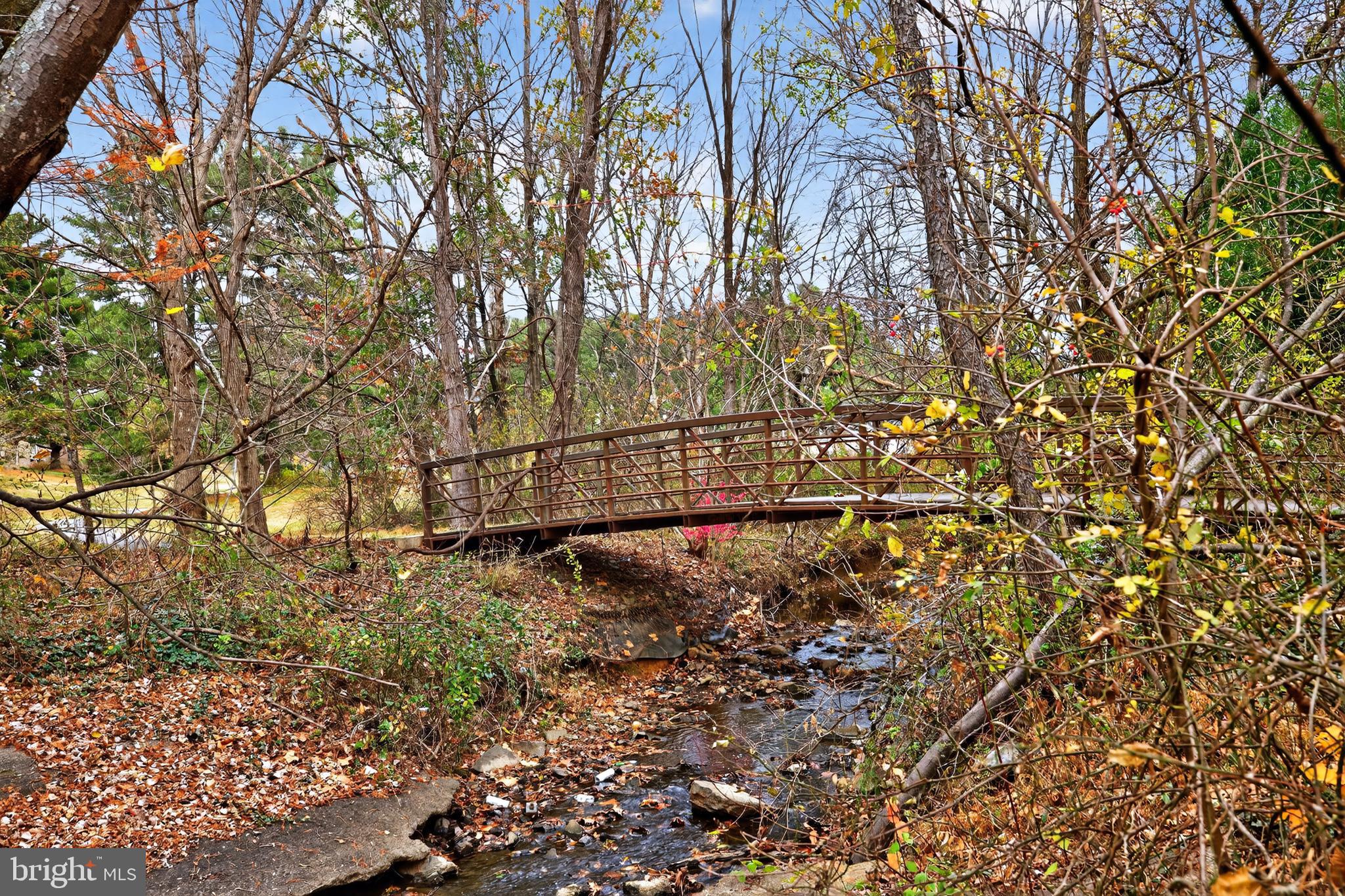 9961 Lake Landing Road Gaithersburg, MD 20886 - Photo 34 of 40 a view of a yard with wooden fence