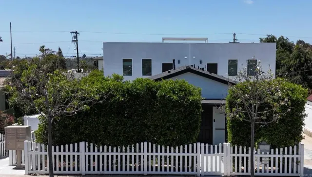 a house view with a garden space
