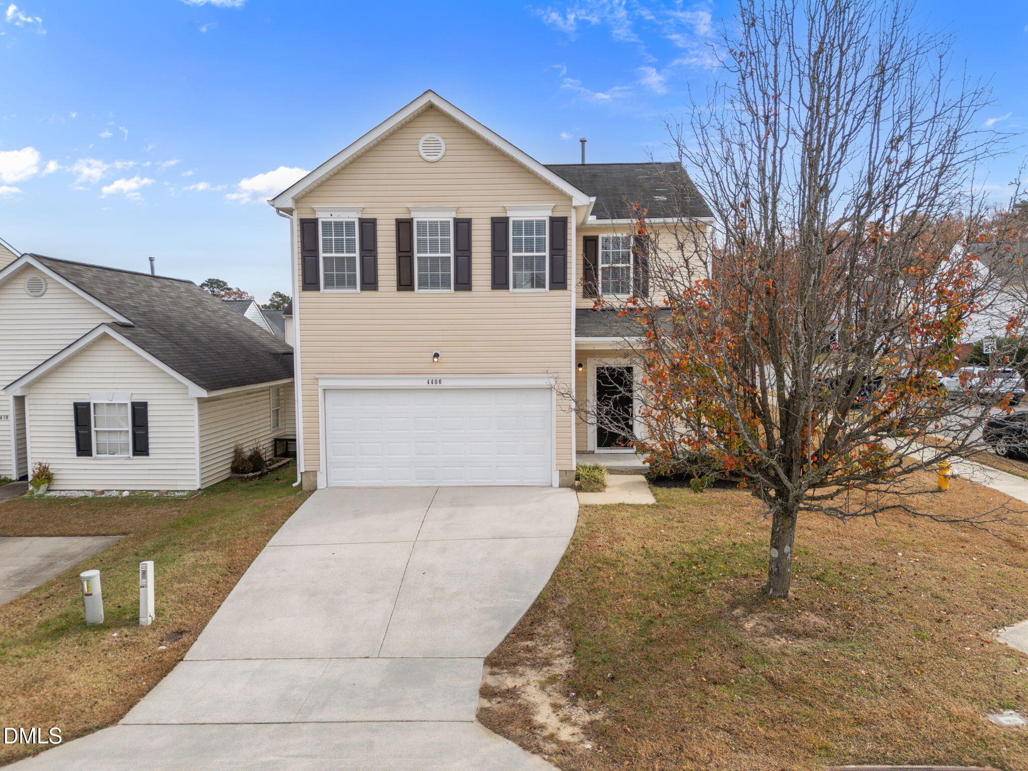 4406 Snowcrest Lane Raleigh, NC 27616 - Photo 1 of 41 a front view of a house with a yard and garage