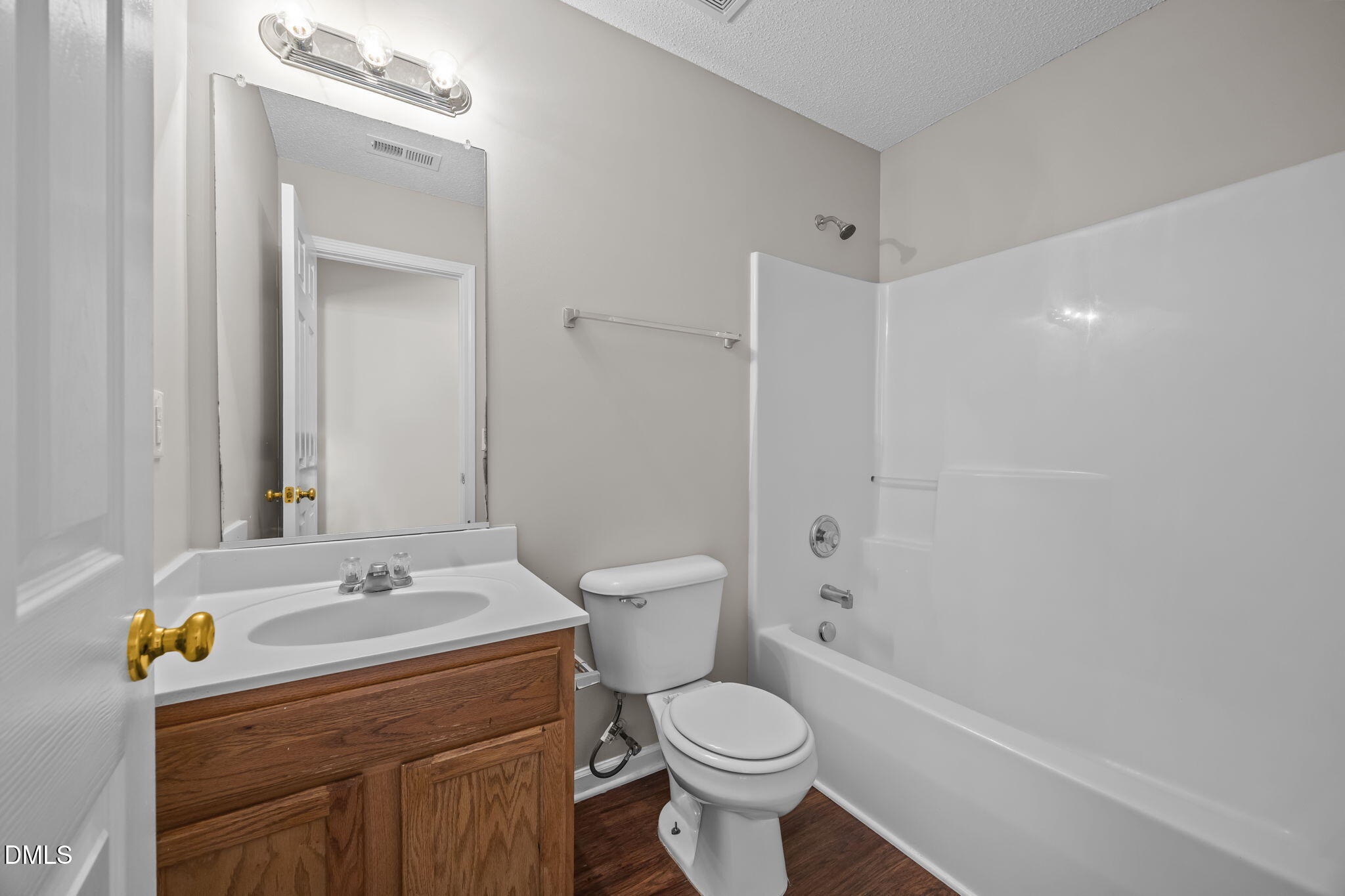 4406 Snowcrest Lane Raleigh, NC 27616 - Photo 26 of 41 a bathroom with a sink toilet and shower