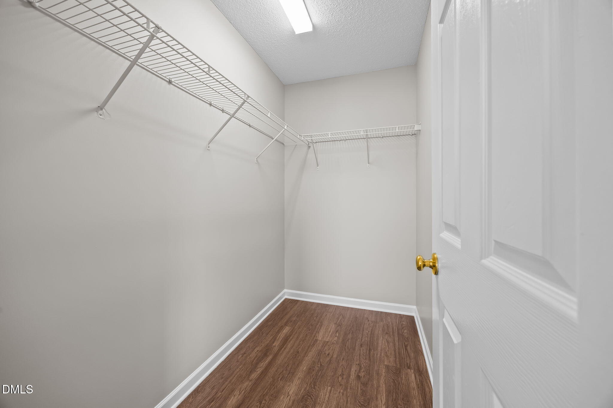 4406 Snowcrest Lane Raleigh, NC 27616 - Photo 29 of 41 a view of small space with racks on the wall