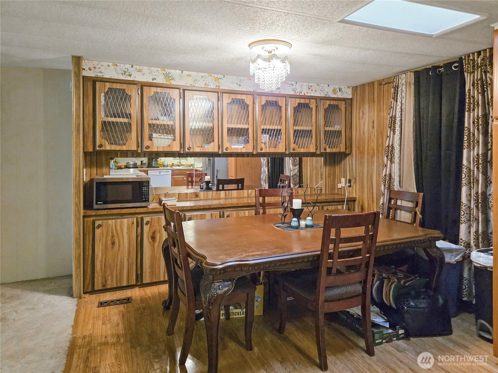 201 Union Avenue Southeast, Unit 192 Renton, WA 98059 - Photo 6 of 8 a view of a dining room with furniture and window