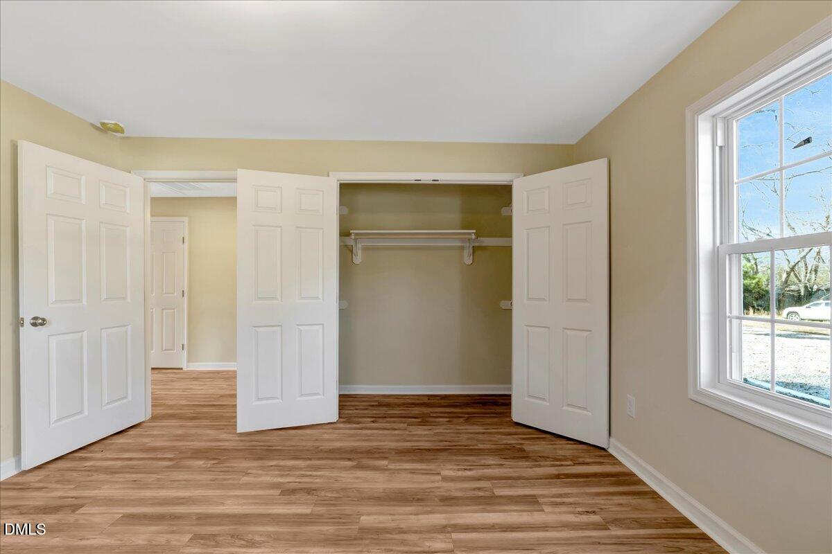 1003 Alert Road Warrenton, NC 27589 - Photo 13 of 20 View of the closet-no wasted space with closet racks on the left & right side also