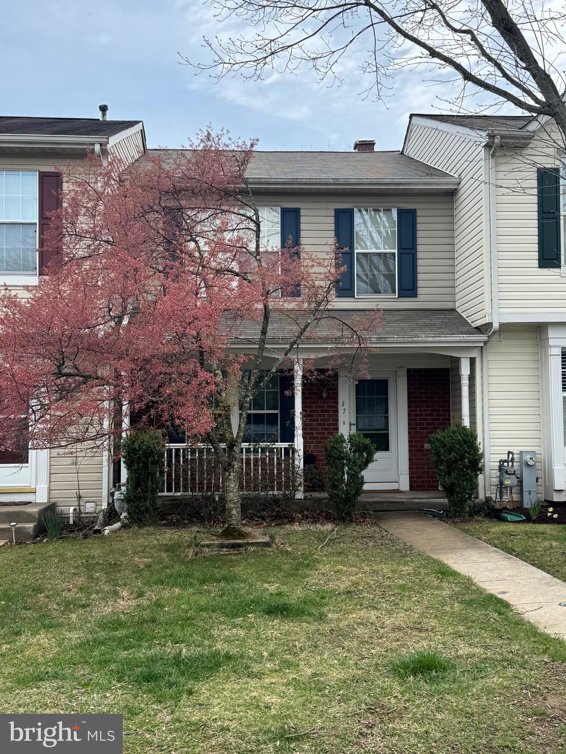 37 Ironwood Circle Baltimore, MD 21209 - Photo 1 of 1 a front view of a house with a yard