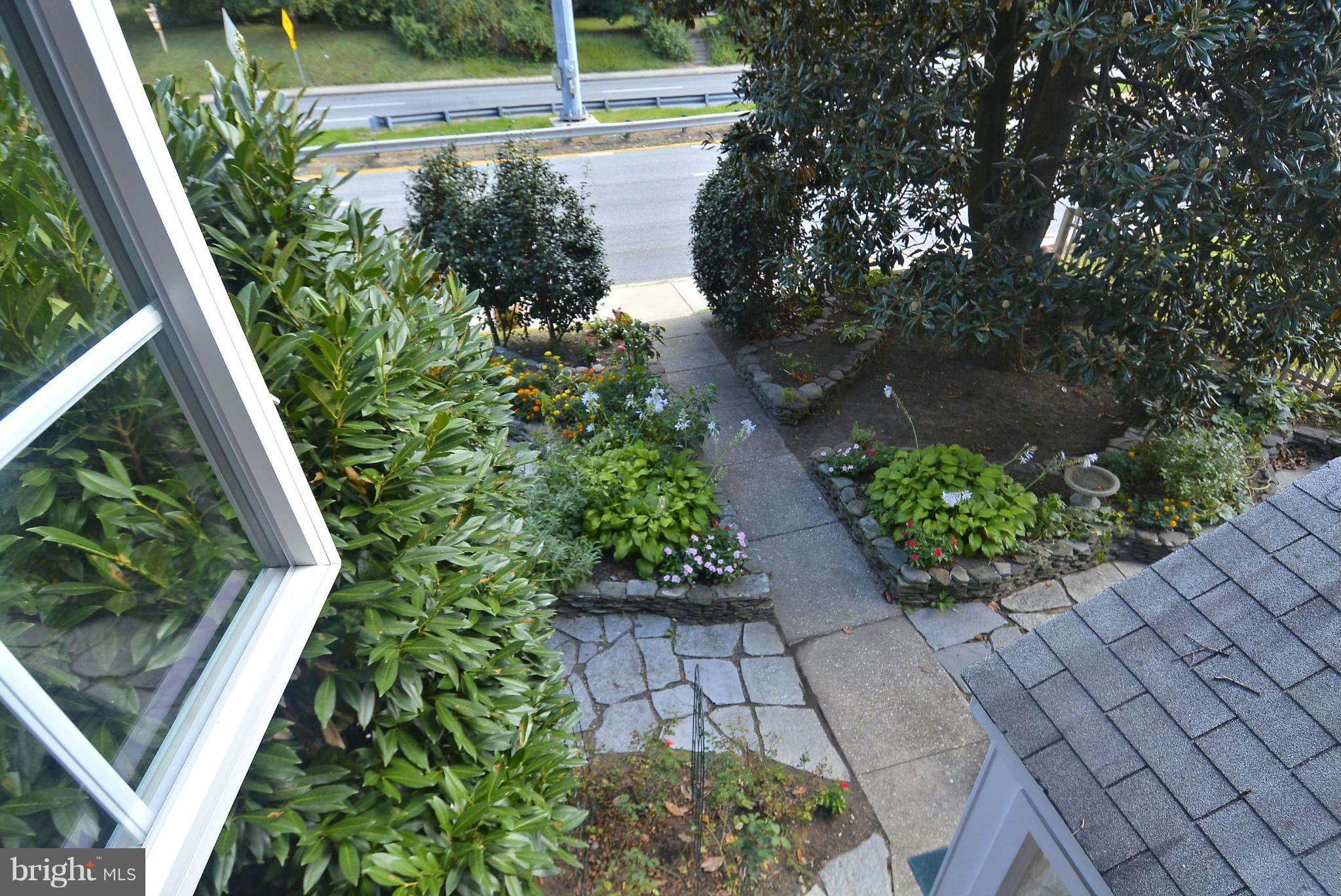9516 Colesville Road Silver Spring, MD 20901 - Photo 22 of 26 a view of statue in the garden