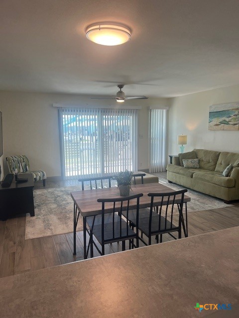 2292 North Fulton Beach Road, Unit 702 Rockport, TX 78382 - Photo 8 of 47 a dining room with furniture and window