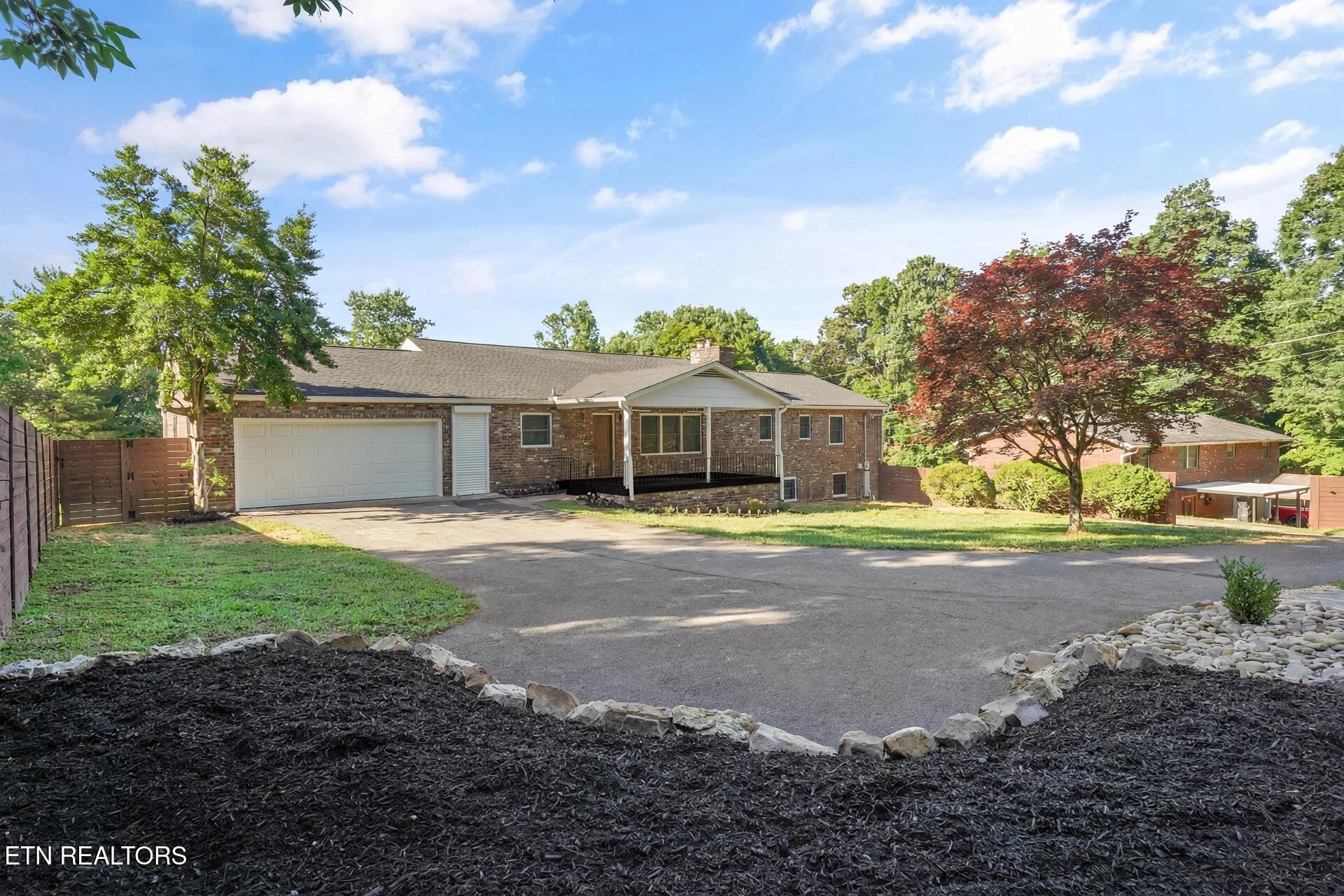 5226 Luttrell Road Knoxville, TN 37918 - Photo 42 of 42 suburban_brick_house_black_porch