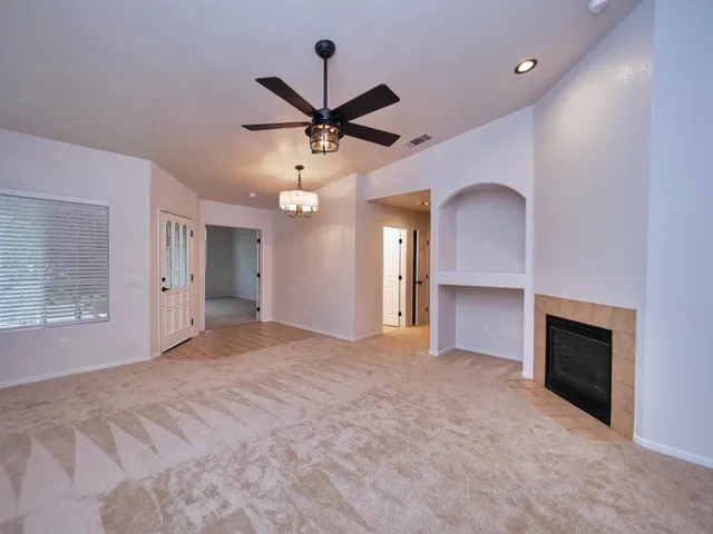 a kitchen with a stove a sink and a refrigerator