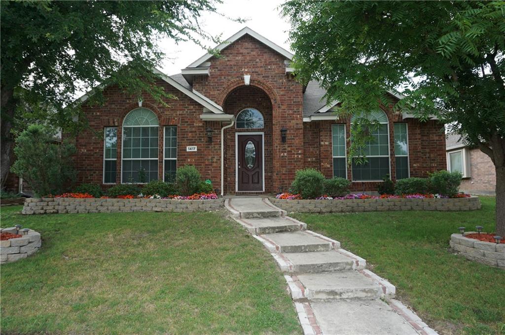 1417 Brook Ridge Avenue Allen, TX 75002 - Photo 1 of 1 a front view of a house with garden