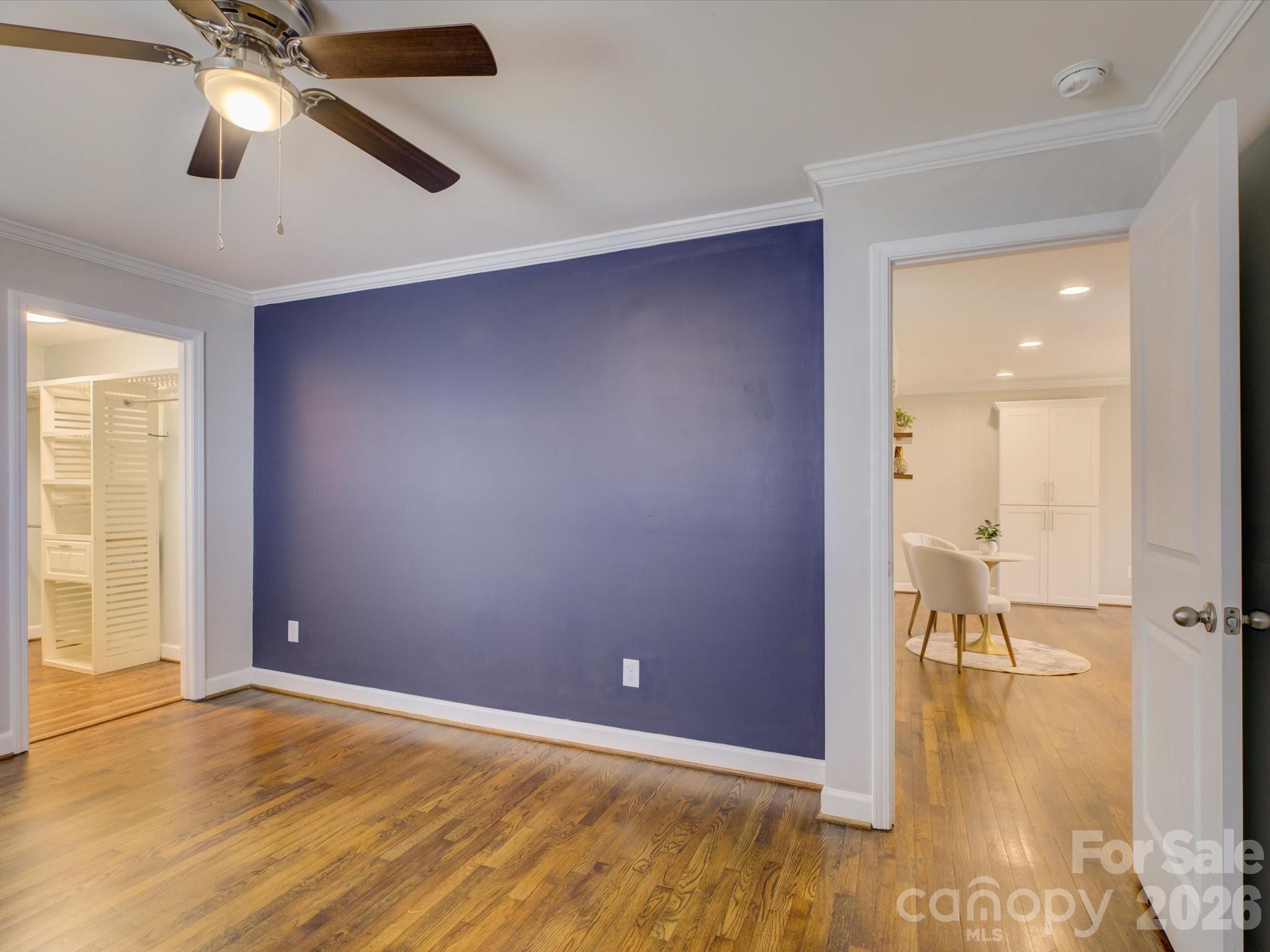 204 West Elliott Street Fort Mill, SC 29715 - Photo 19 of 43 en empty room with window and wooden floor