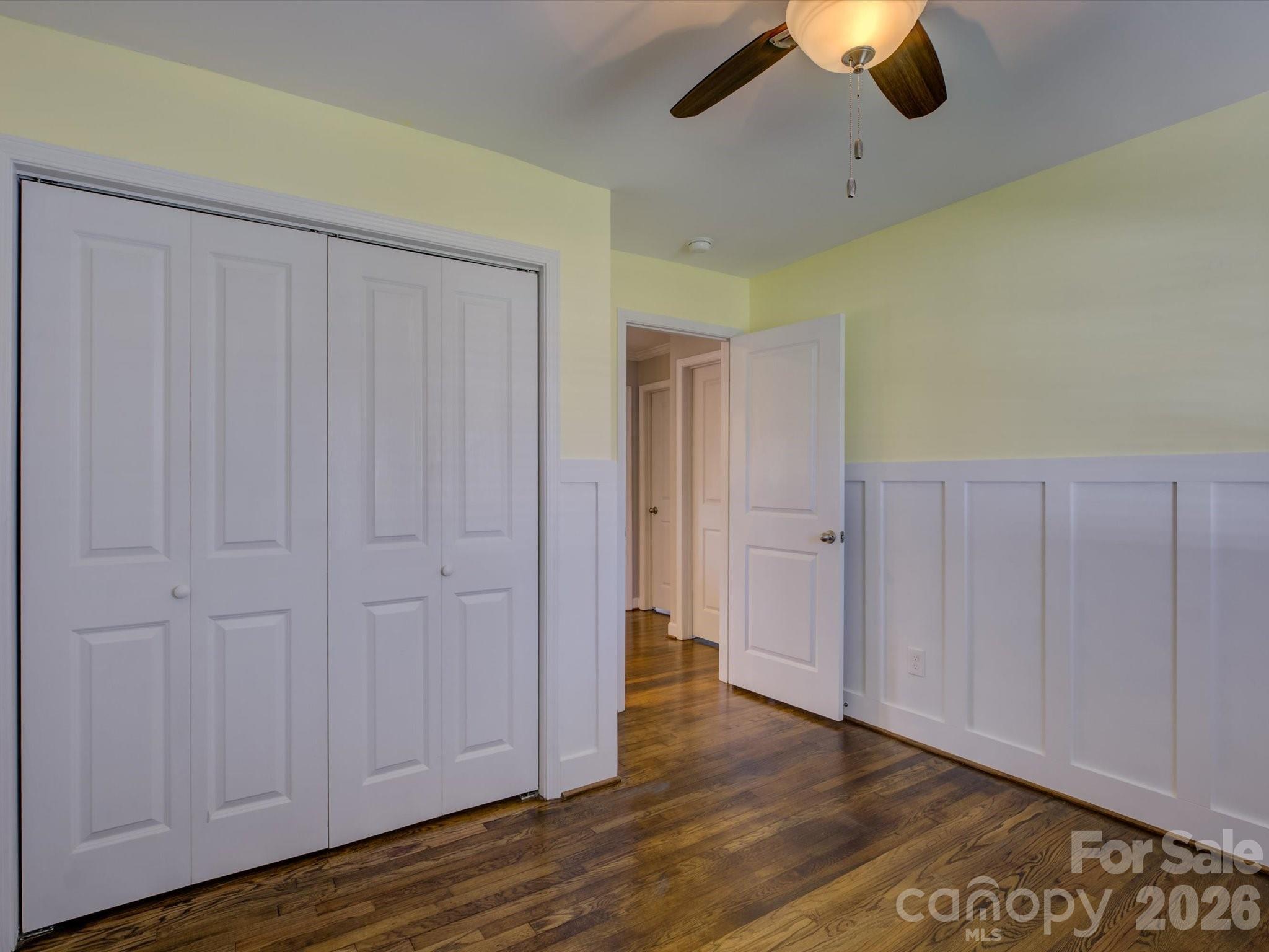 204 West Elliott Street Fort Mill, SC 29715 - Photo 25 of 43 a view of empty room with wooden floor