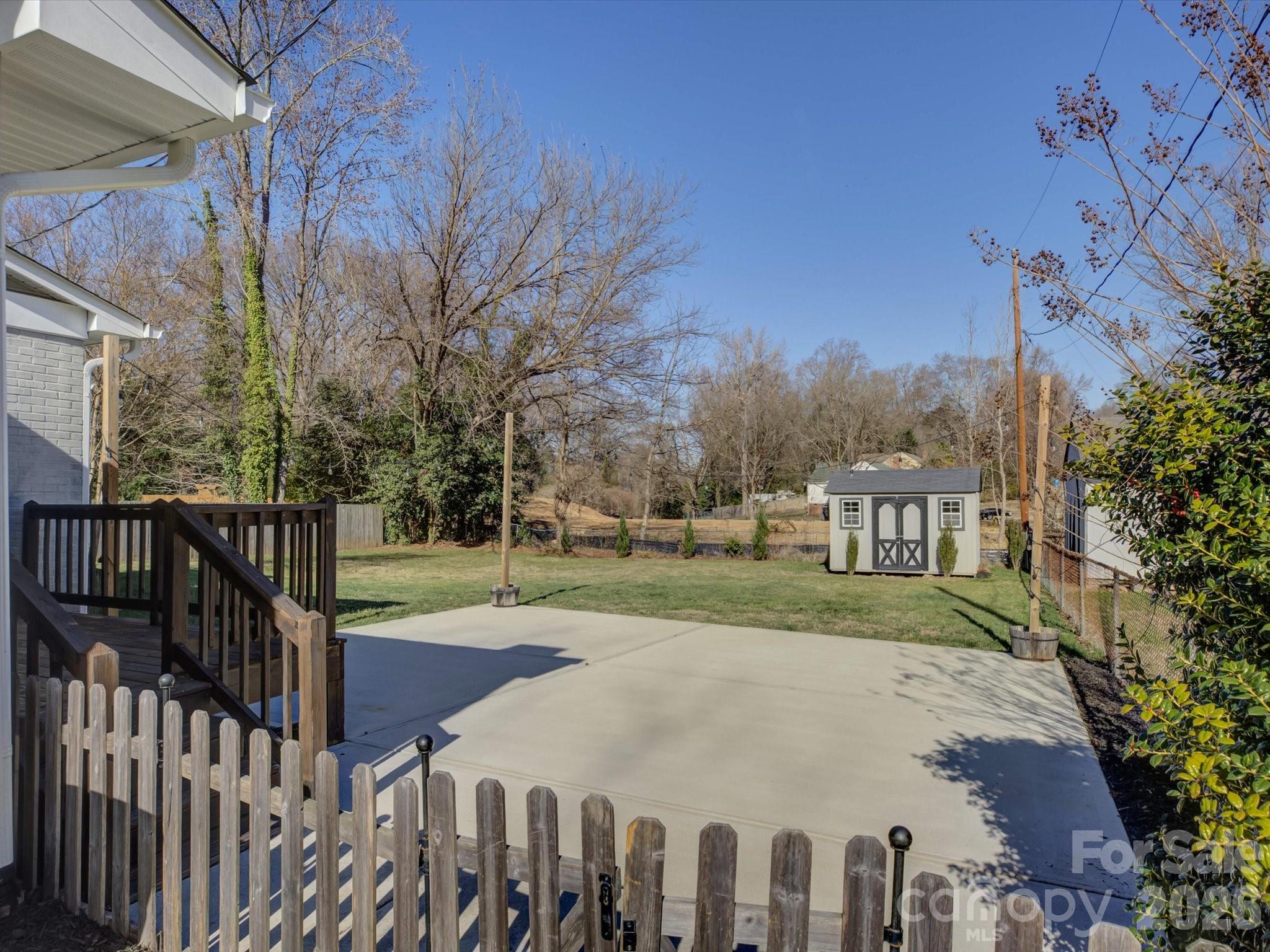 204 West Elliott Street Fort Mill, SC 29715 - Photo 29 of 43 a view of a yard with wooden fence