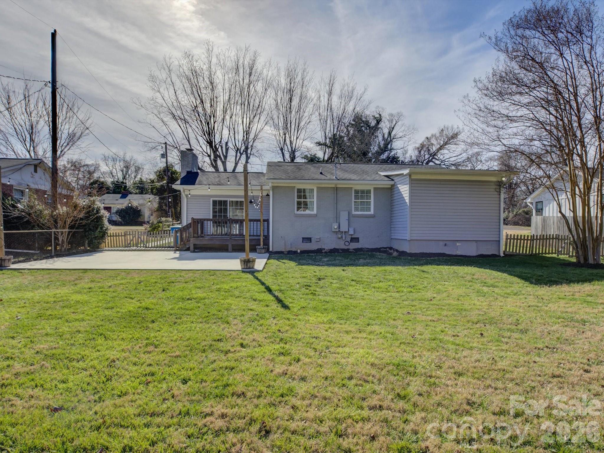 204 West Elliott Street Fort Mill, SC 29715 - Photo 31 of 43 a view of a house with a yard