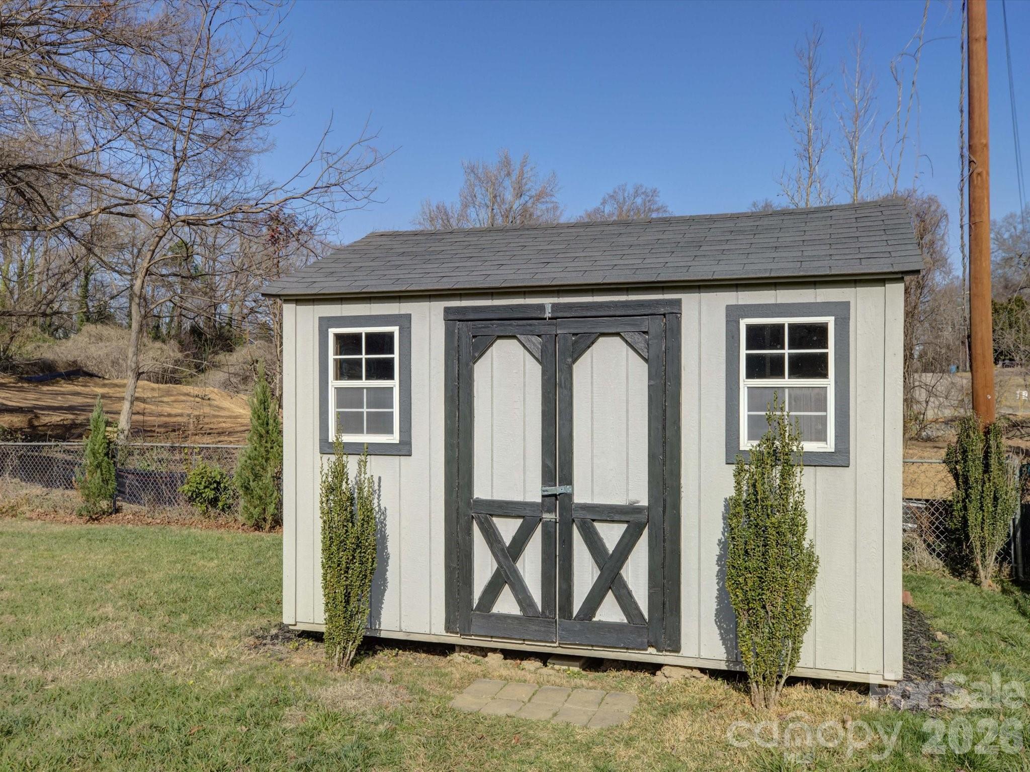 204 West Elliott Street Fort Mill, SC 29715 - Photo 34 of 43 a front view of a house with garden