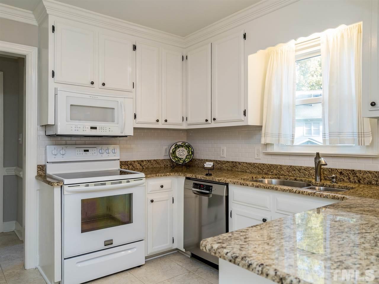 8508 Council Court Raleigh, NC 27615 - Photo 11 of 27 The well-appointed kitchen will be a joy to cook in.