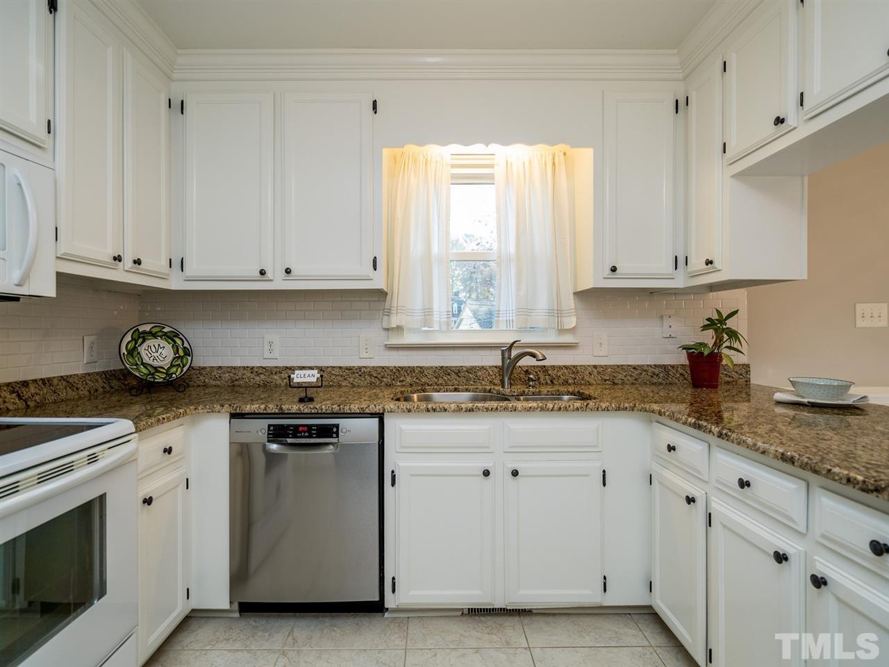 8508 Council Court Raleigh, NC 27615 - Photo 12 of 27 You will find abundant cabinet storage in this well-designed kitchen.