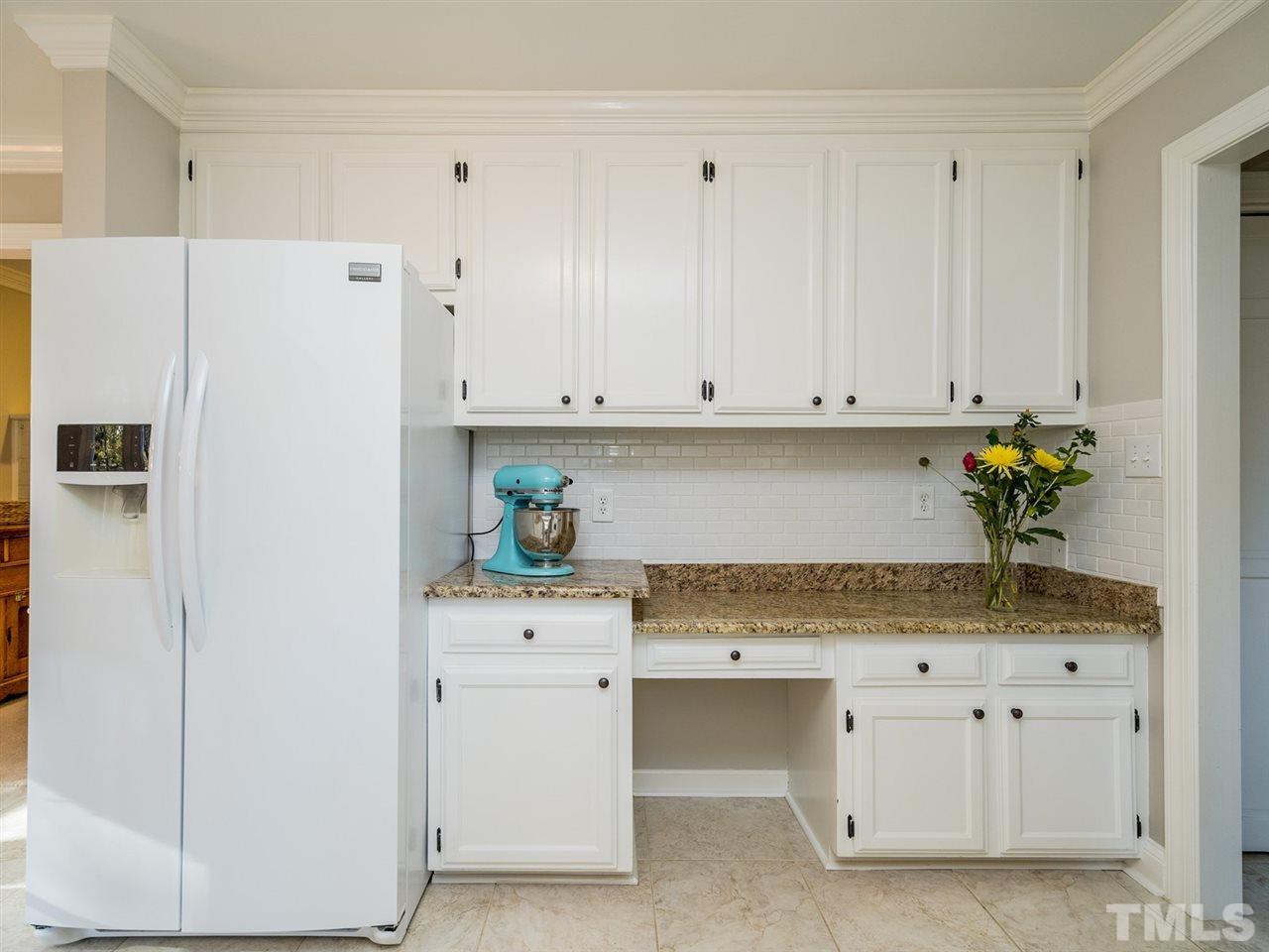 8508 Council Court Raleigh, NC 27615 - Photo 14 of 27 The built-in desk in the kitchen is always a plus.