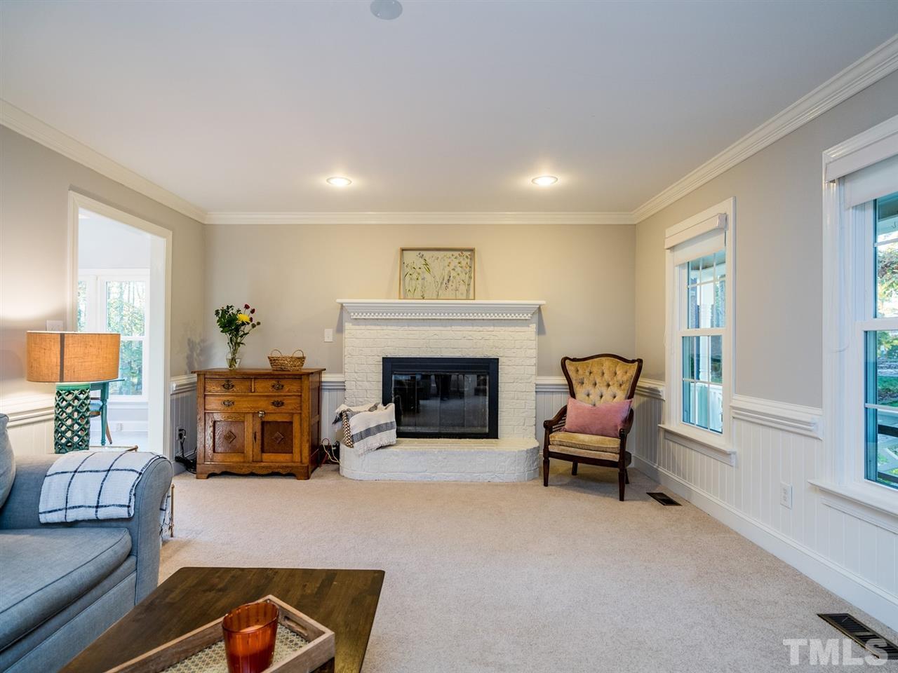 8508 Council Court Raleigh, NC 27615 - Photo 8 of 27 Wainscoting and crown moulding complete the package in this lovely room.