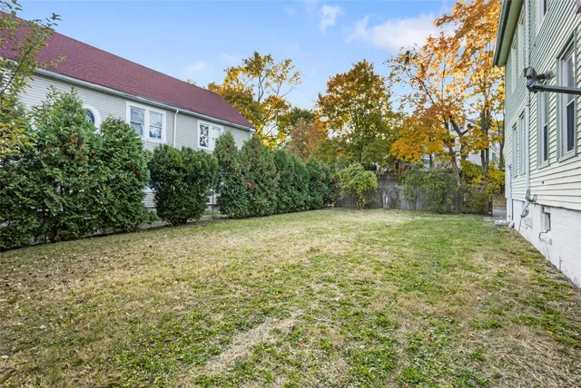 a view of a yard with a house