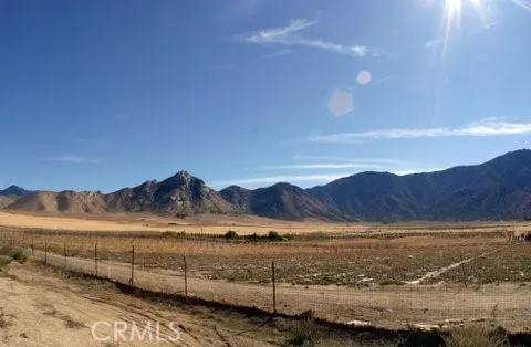 a view of ocean and mountain