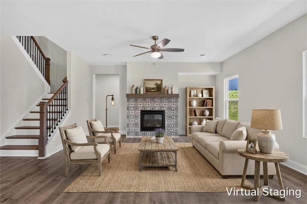 107 Ledgemont Way Acworth, GA 30101 - Photo 12 of 57 a living room with furniture and a fireplace
