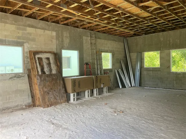 a view of a room with windows