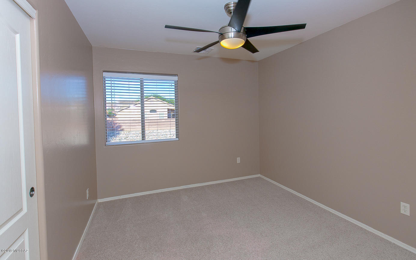 39103 Winners Circle Tucson, AZ 85739 - Photo 12 of 19 an empty room with a window