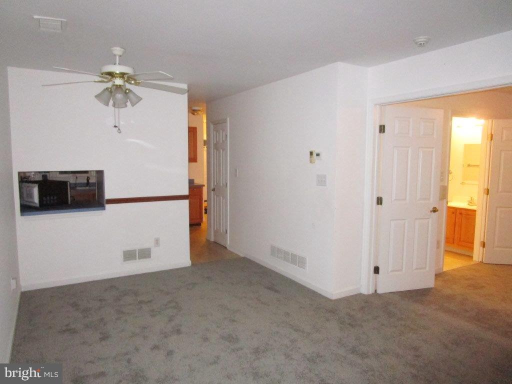 22 East Village Road, Unit 22 Newark, DE 19713 - Photo 14 of 16 living rm with pass thru