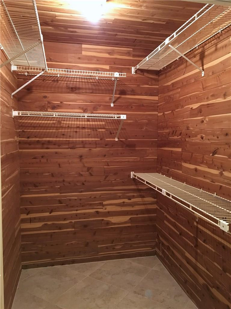 6546 Patio Lane, Unit 3 Boca Raton, FL 33433 - Photo 20 of 27 Cedar walk-in closet in Master Bedroom