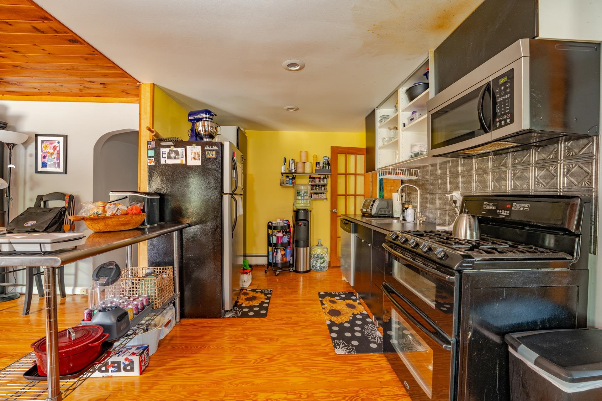32 Norwood Road Marmora, NJ 08223 - Photo 13 of 32 a kitchen with stainless steel appliances granite countertop a stove and a refrigerator