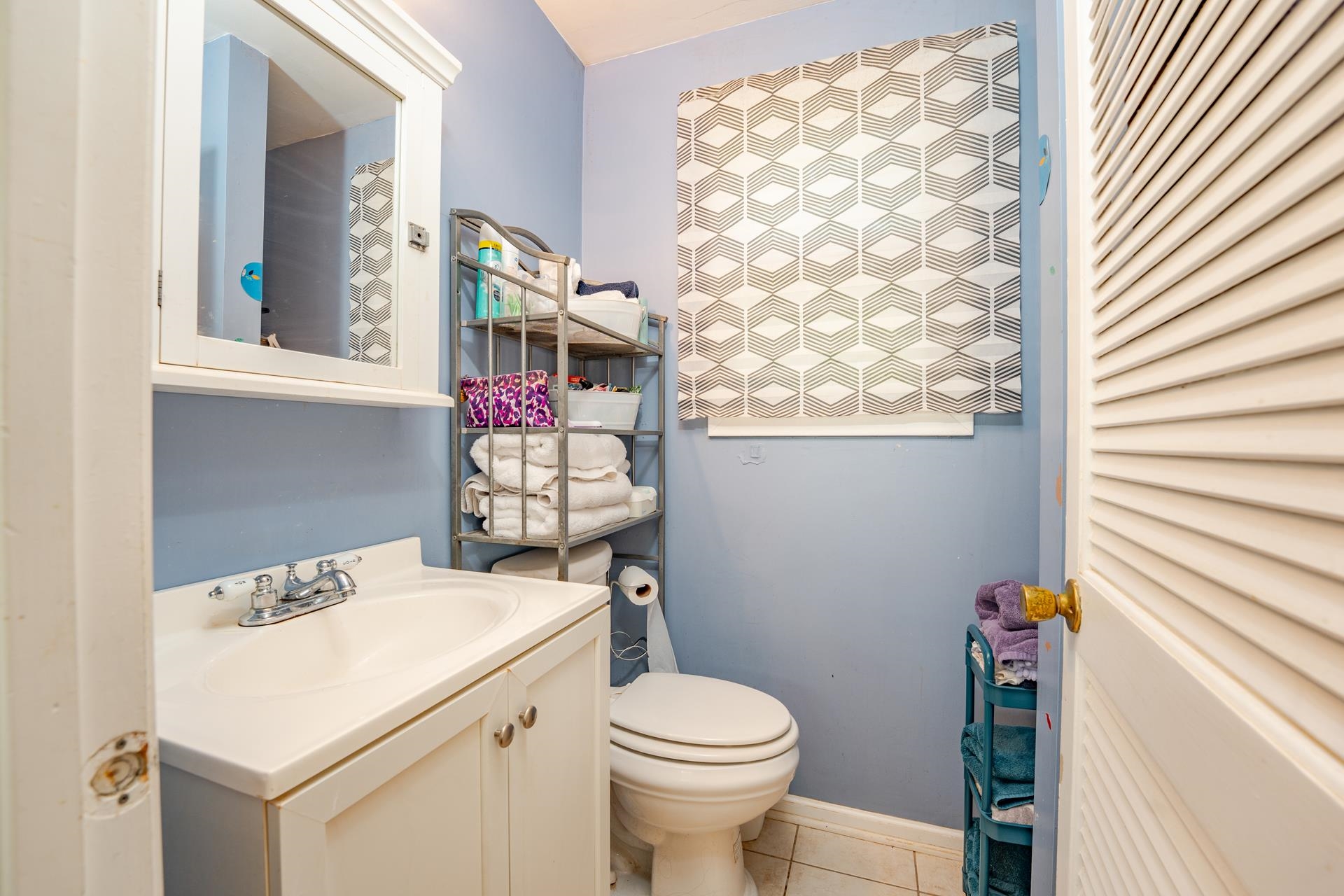 32 Norwood Road Marmora, NJ 08223 - Photo 17 of 32 a bathroom with a sink toilet and window