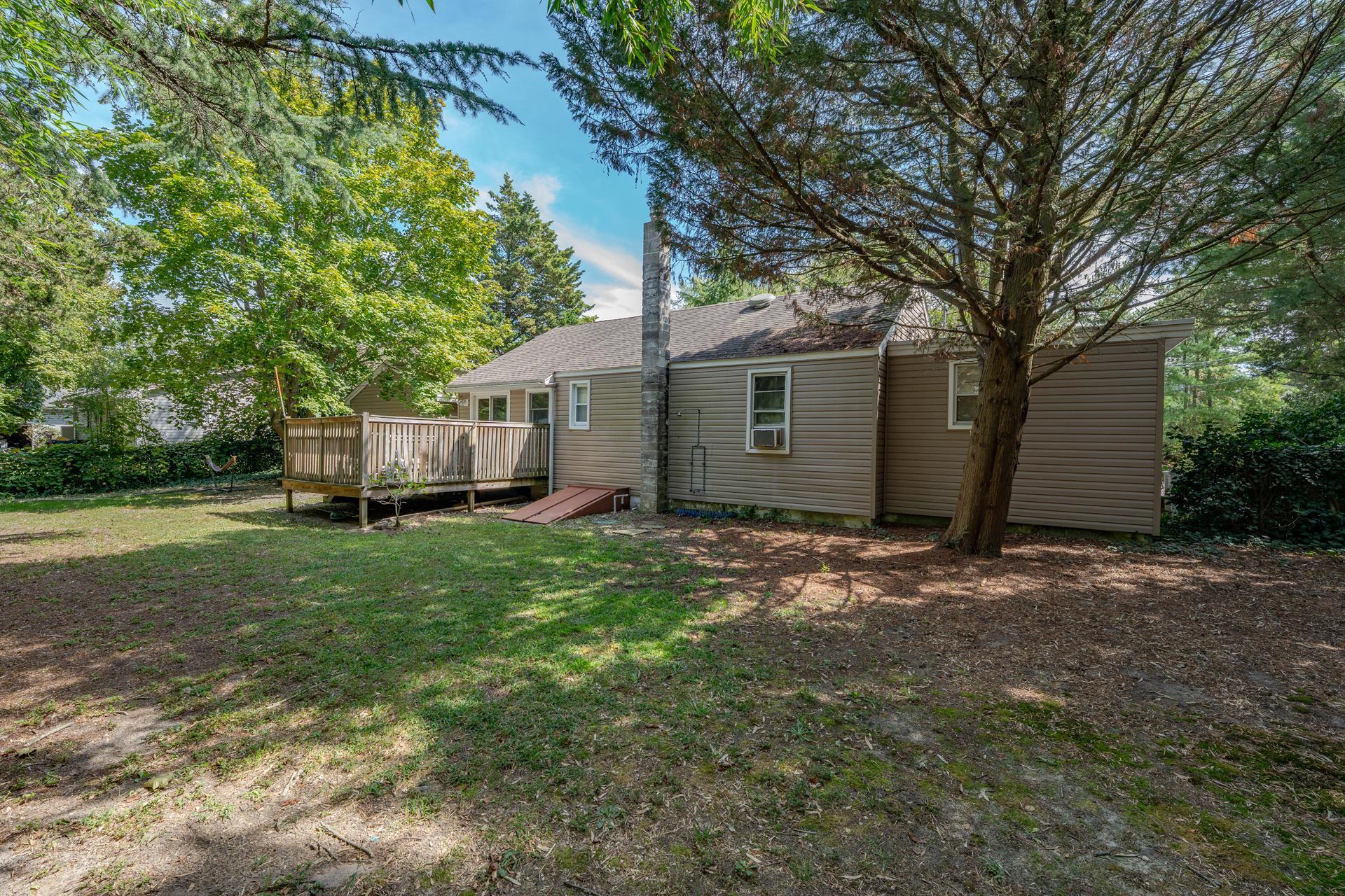 32 Norwood Road Marmora, NJ 08223 - Photo 24 of 32 a view of a house with a back yard