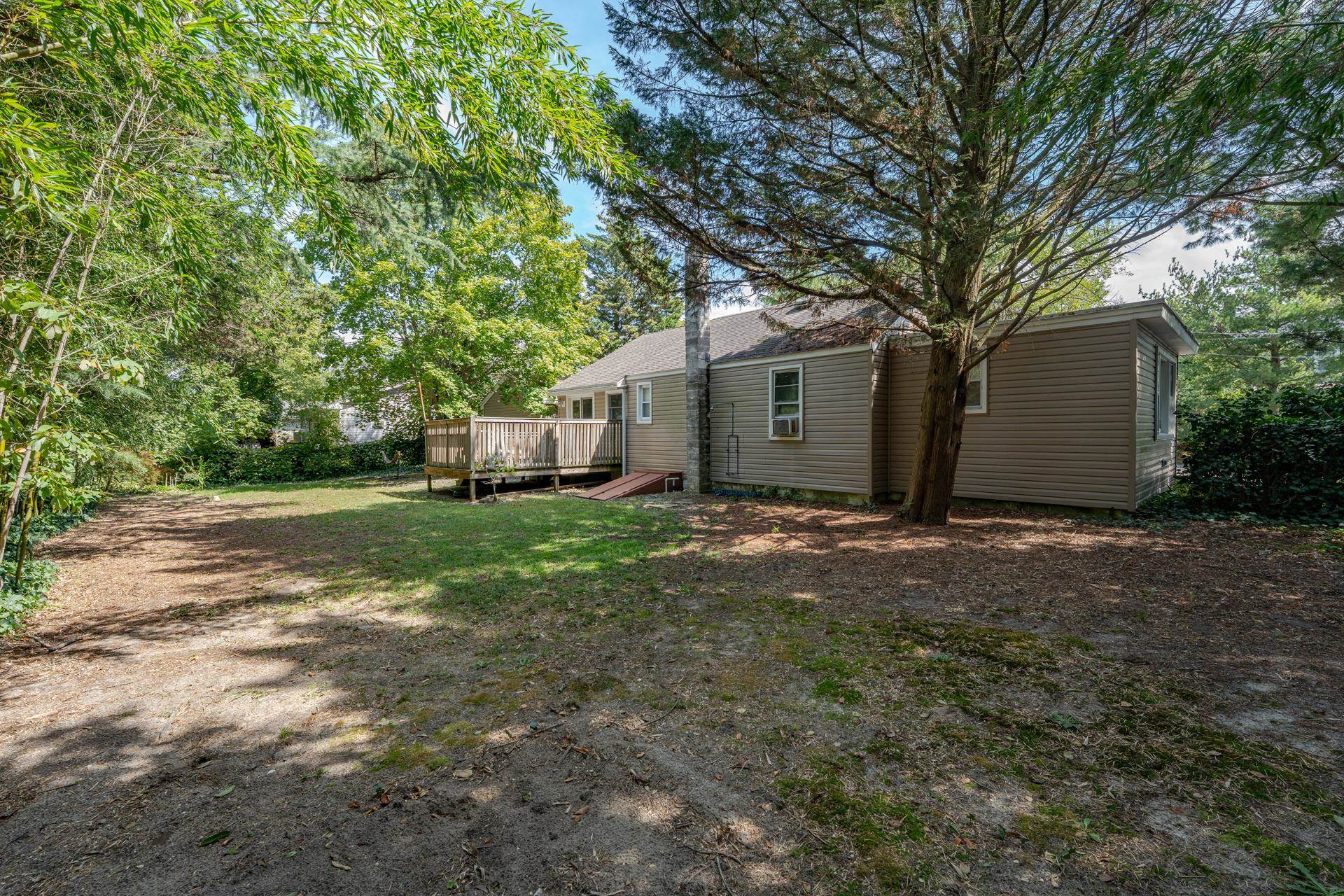 32 Norwood Road Marmora, NJ 08223 - Photo 25 of 32 a view of a house with backyard and tree