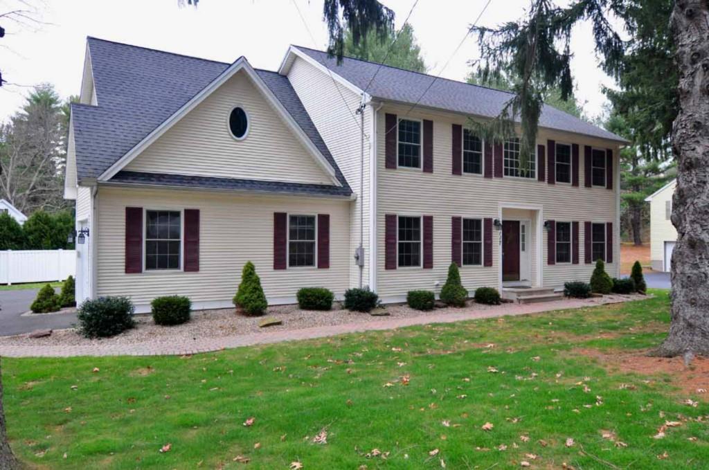 a view of a yard in front of a house
