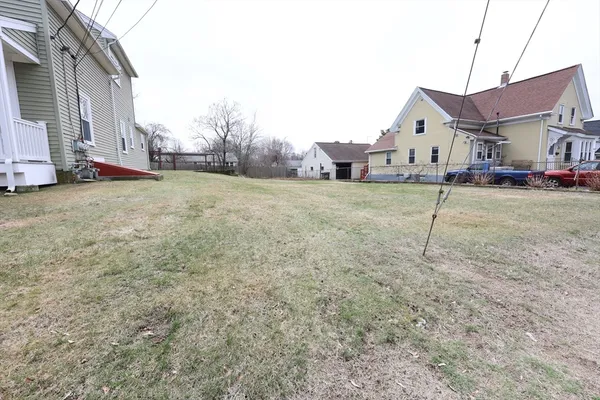 a house view with a backyard space