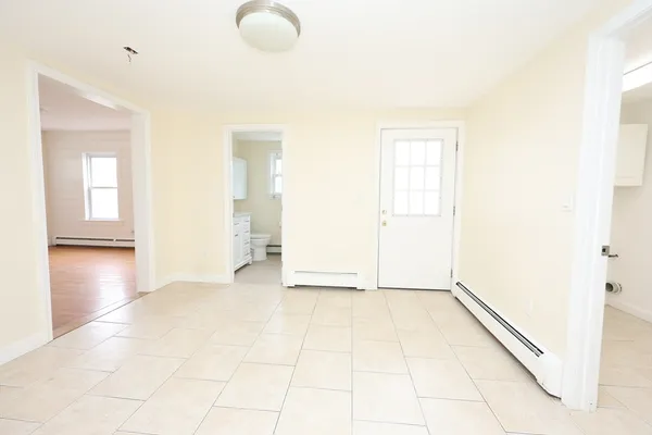 view of empty room with windows