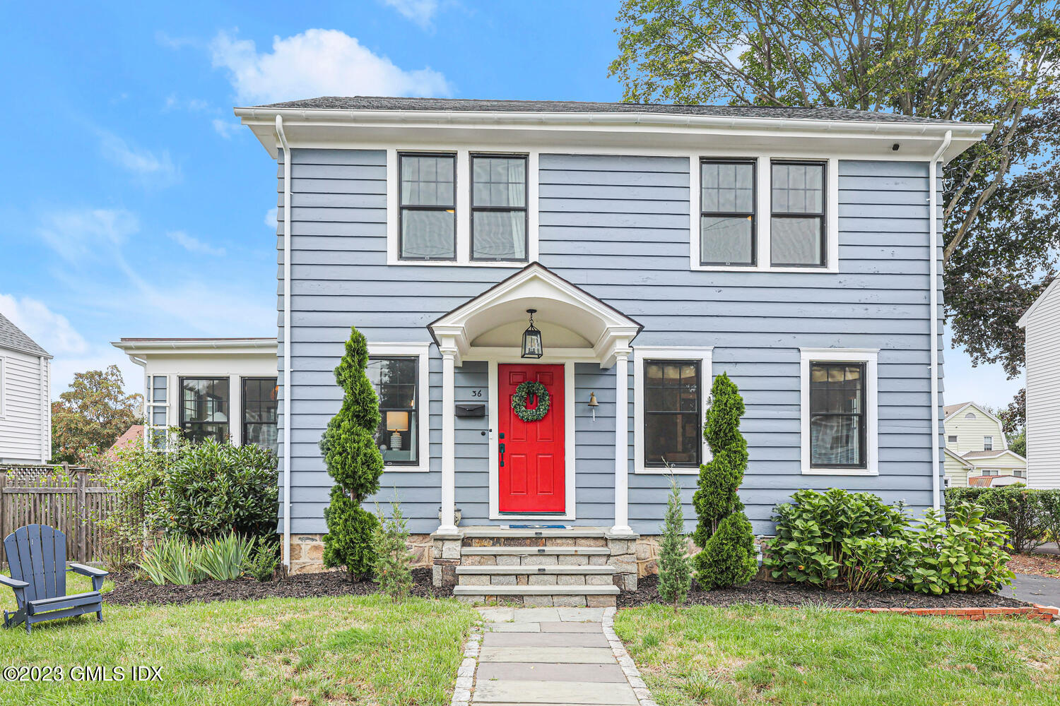 36 Ralph Street Stamford, CT 06902 - Photo 1 of 20 a front view of a house with garden