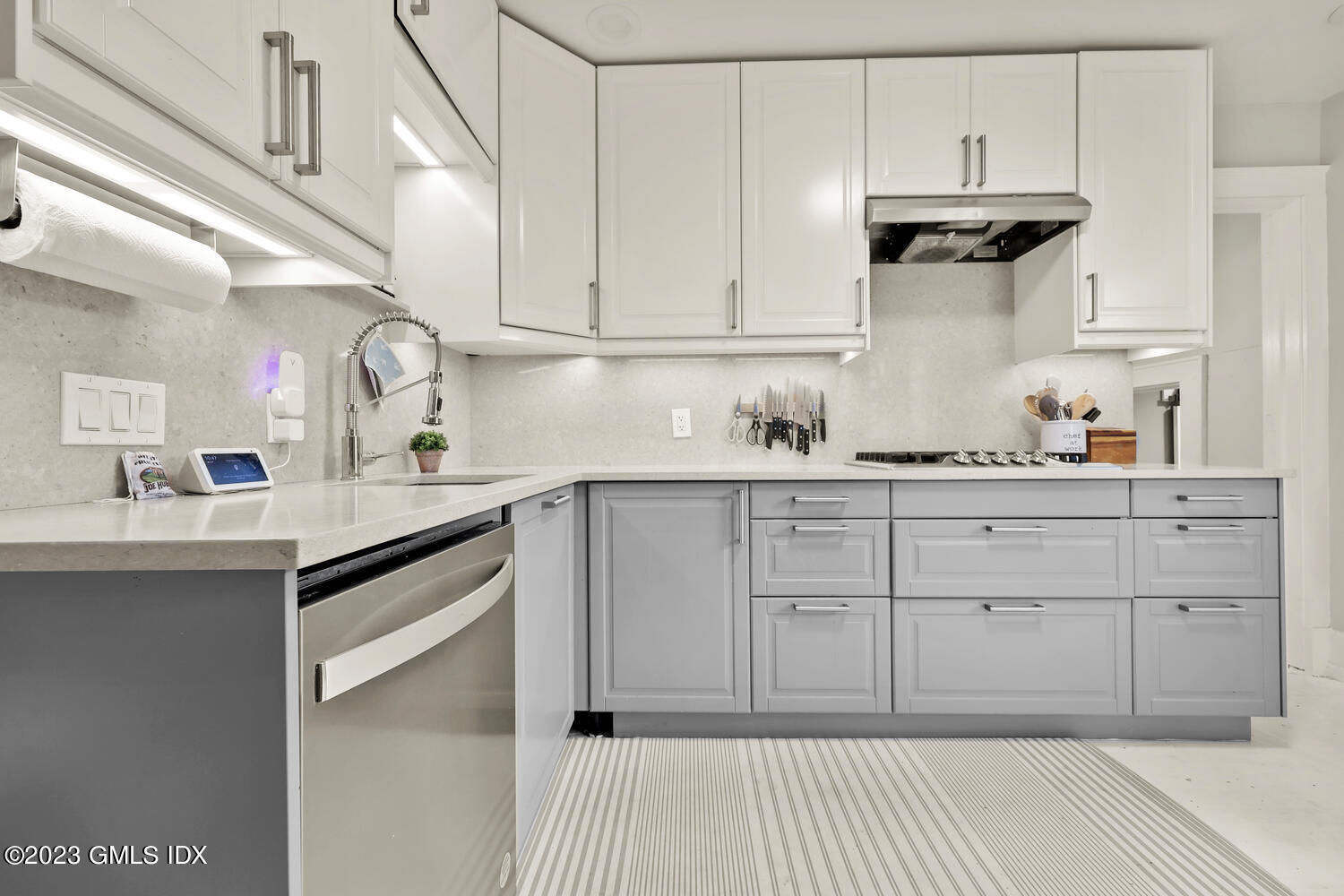 36 Ralph Street Stamford, CT 06902 - Photo 3 of 20 a kitchen with cabinets and appliances