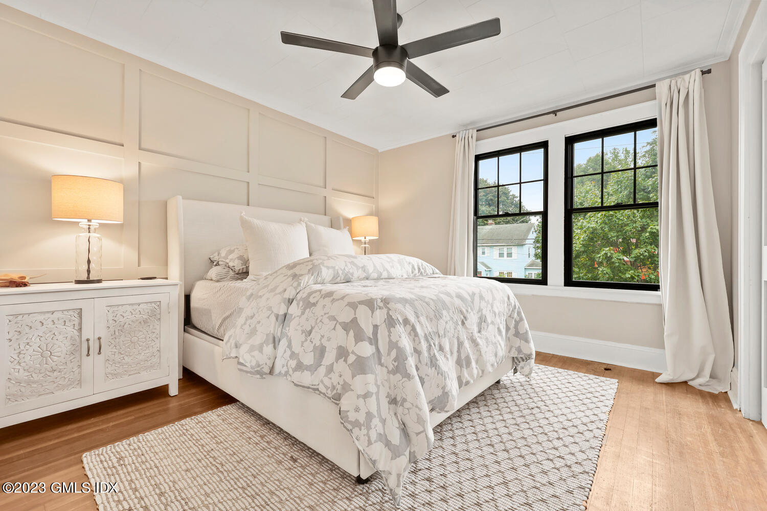 36 Ralph Street Stamford, CT 06902 - Photo 8 of 20 a bed room with a bed and a window