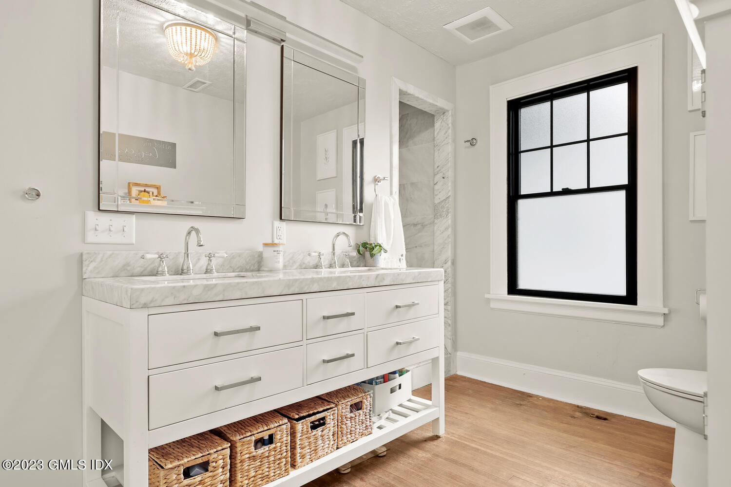 36 Ralph Street Stamford, CT 06902 - Photo 9 of 20 a bathroom with a sink mirror and vanity