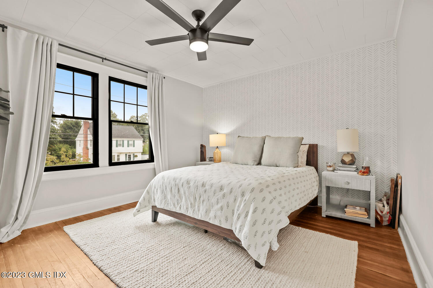 36 Ralph Street Stamford, CT 06902 - Photo 10 of 20 a bedroom with a bed and a window