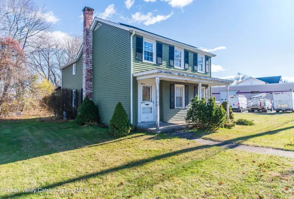 a view of a house with a swimming pool