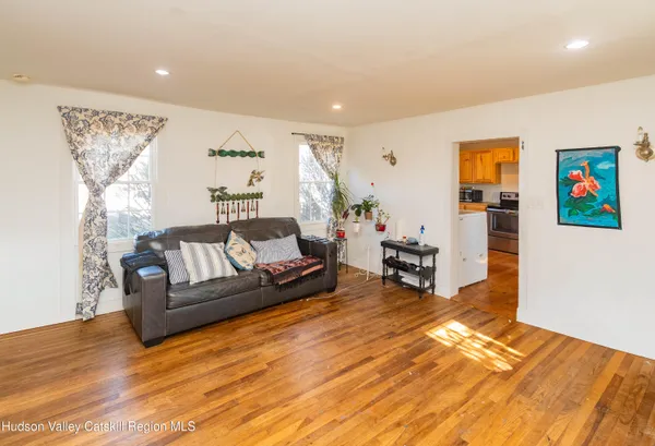 a living room with furniture and a couch