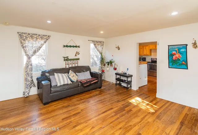 a living room with furniture and a couch