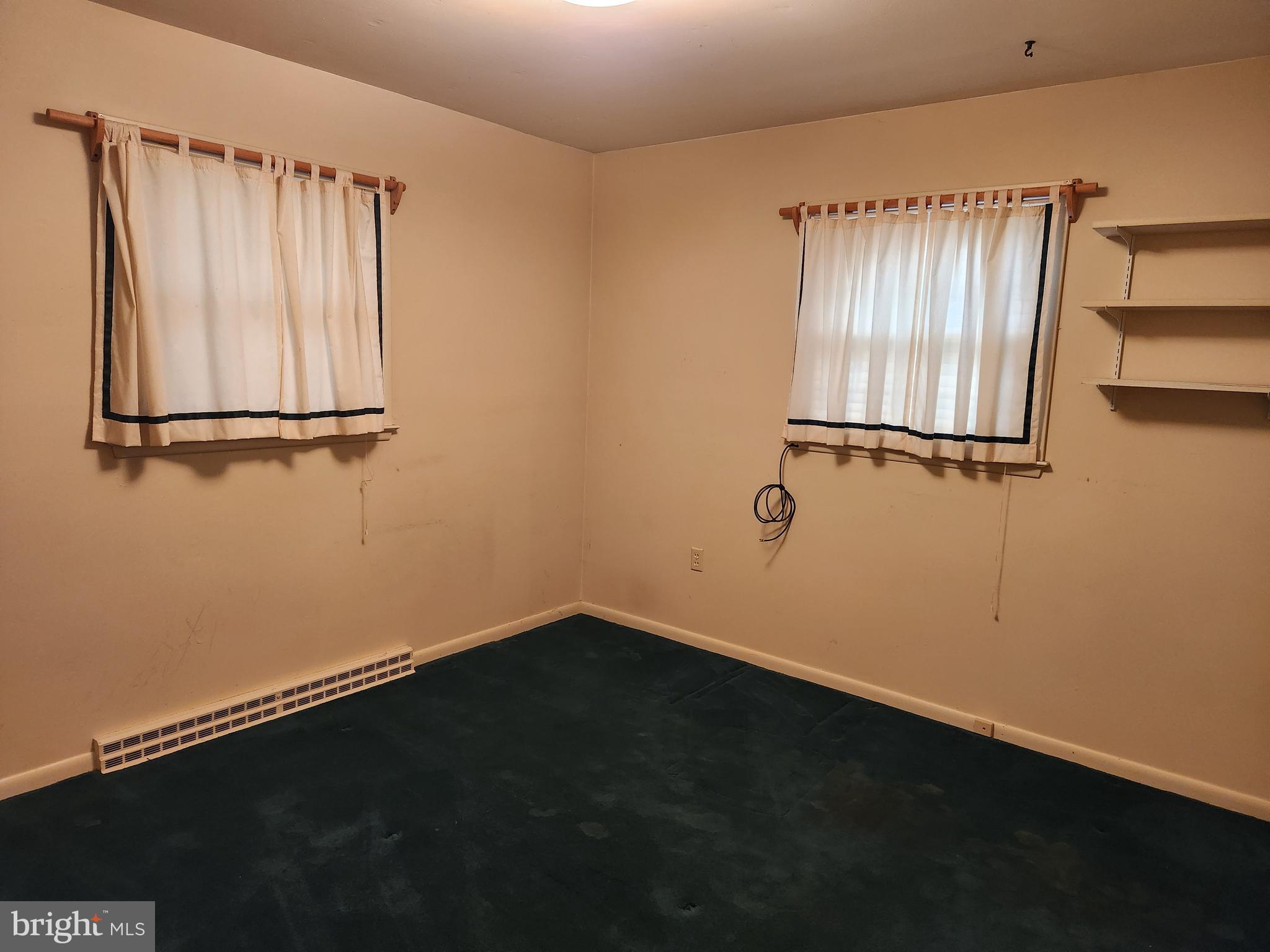 3116 Linda Lane Sinking Spring, PA 19608 - Photo 16 of 44 a view of a room with wooden floor and windows