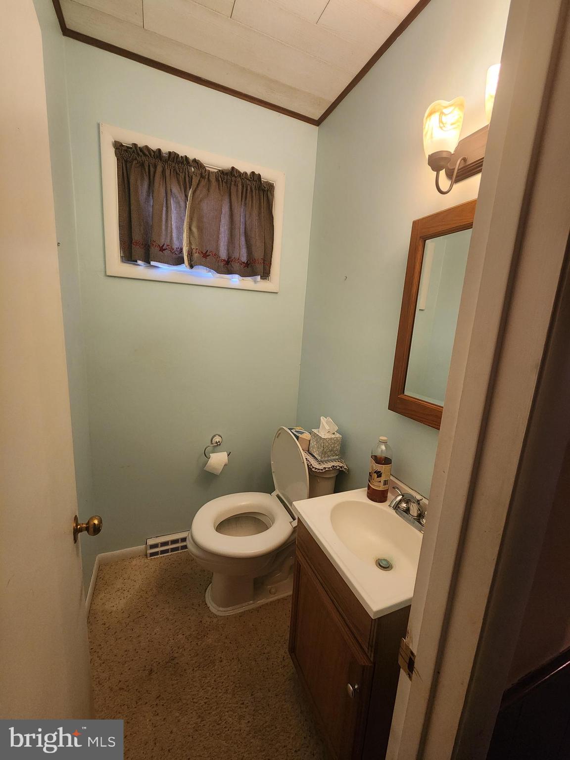 3116 Linda Lane Sinking Spring, PA 19608 - Photo 34 of 44 a bathroom with a toilet sink and mirror