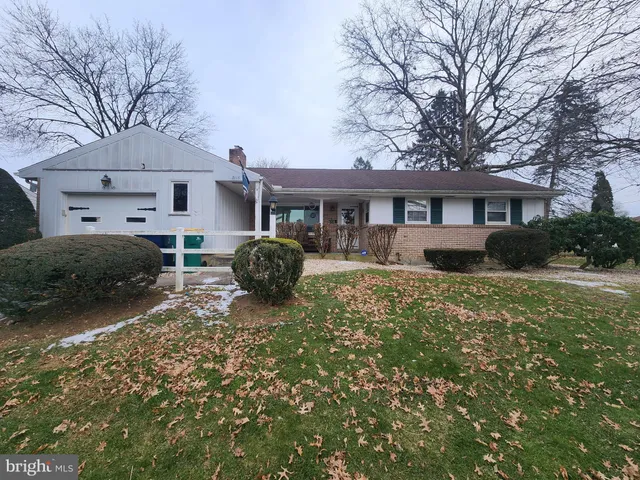 a house view with a garden space