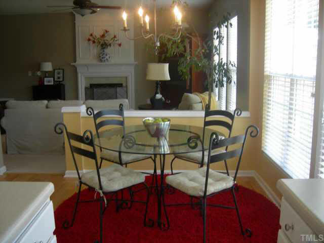 1509 Nealstone Way Raleigh, NC 27614 - Photo 5 of 10 a view of a dining room with furniture window and outside view